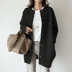 Women's longline button front cardigan with round neckline and long sleeves