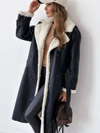 Women's long coat with contrasting shearling-style lining and double-breasted button front