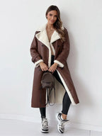Women's long coat with contrasting shearling-style lining and double-breasted button front