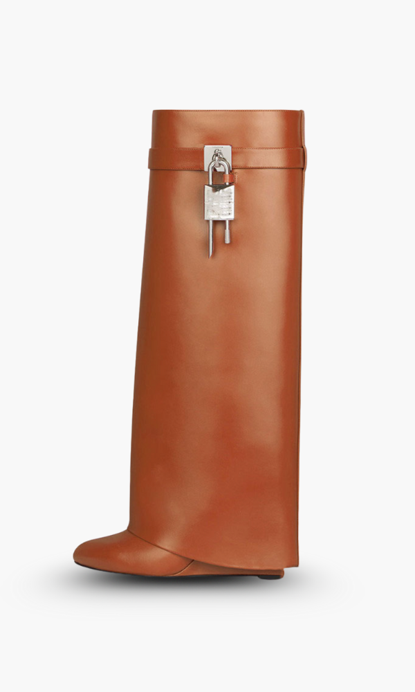 Women's knee-high platform boots with decorative buckle detail