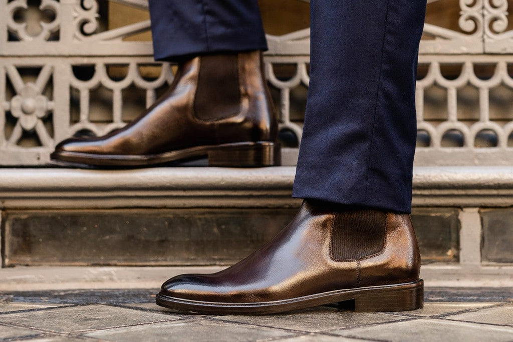 Men's polished brown Chelsea ankle boot with elastic side panels and low heel