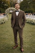 Men's three-piece textured suit with notched jacket, buttoned waistcoat and tailored trousers