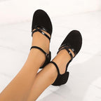 Women's black ballroom dance shoes with layered straps and low heel