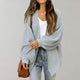 Women's oversized textured knit cardigan with open front and long sleeves