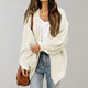 Women's oversized textured knit cardigan with open front and long sleeves