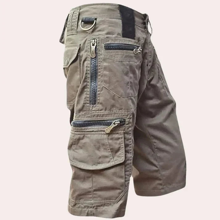 Men's cargo shorts with multiple utility pockets and zip fastenings