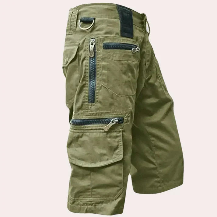 Men's cargo shorts with multiple utility pockets and zip fastenings