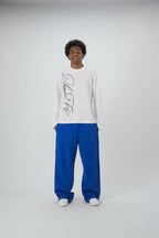 White waffle sweatshirt with black script graphic and long sleeves
