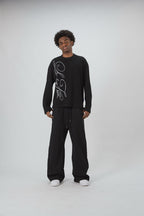 Black men's waffle sweatshirt with vertical script graphic