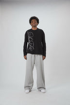 Black men's waffle sweatshirt with vertical script graphic
