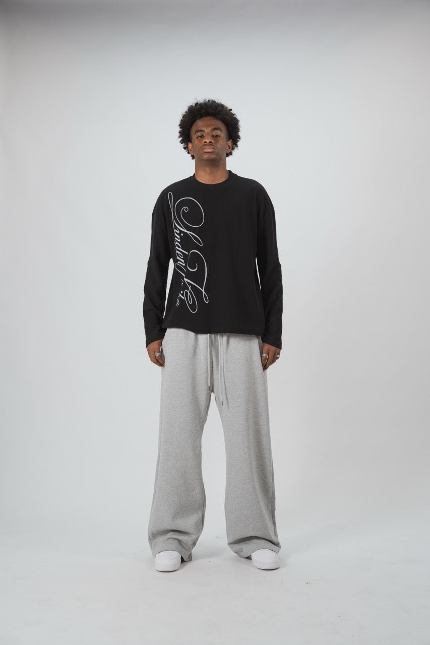 Black men's waffle sweatshirt with vertical script graphic