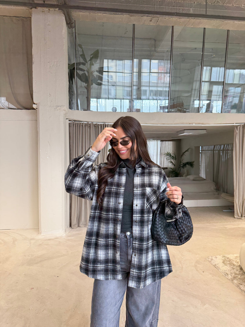 Women's black checked roll neck jumper