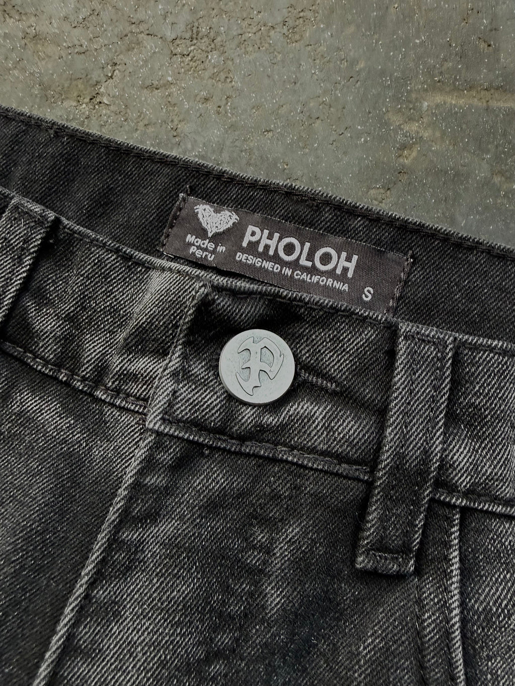 Dark washed wide leg jeans with dragon and floral embroidery