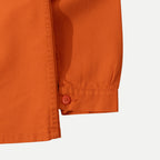 Men's orange utility jacket with collar and patch pockets