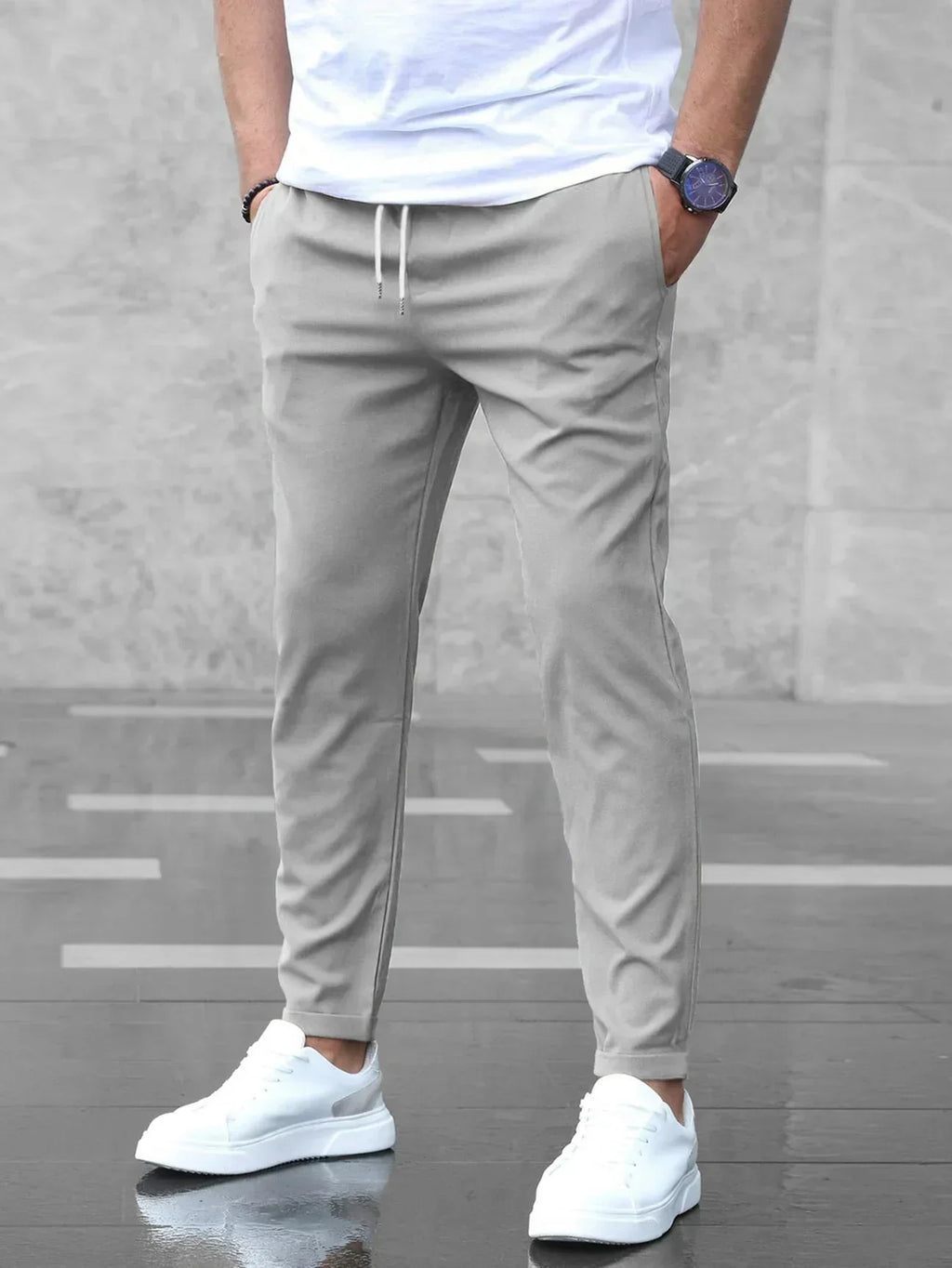 Men's slim fit jogger pants with drawstring waist and tapered cuff in grey