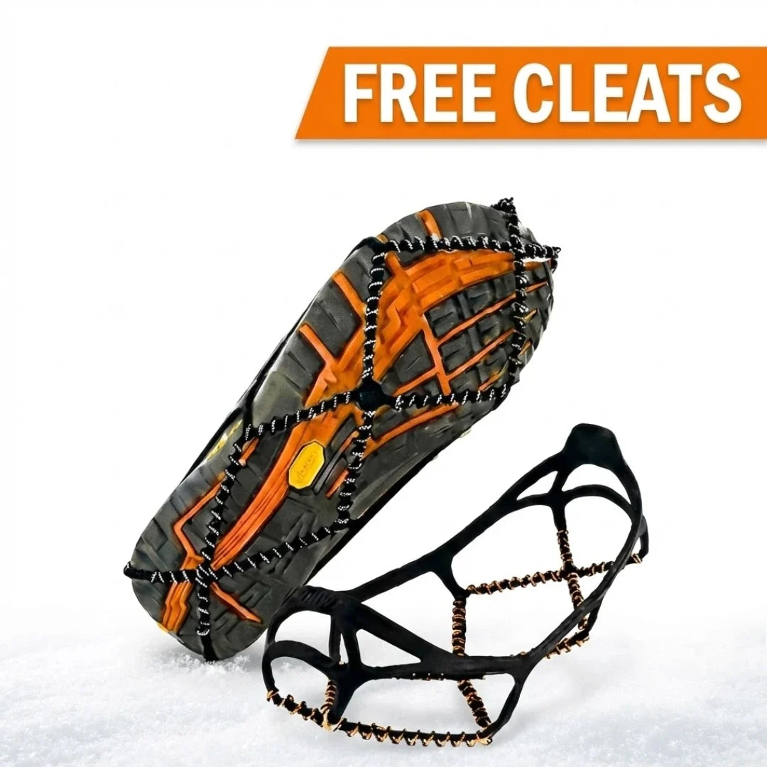 Black stretch ice cleats with traction chains fitted over boots