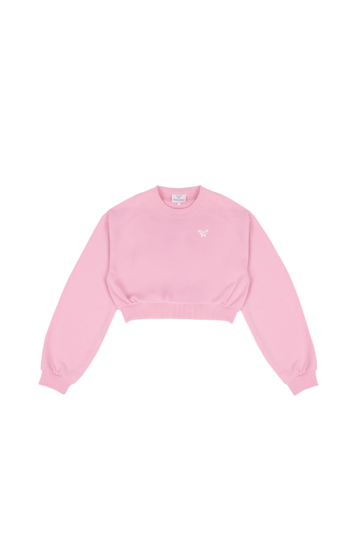 Women's pink cropped crewneck sweatshirt with long sleeves and ribbed trims