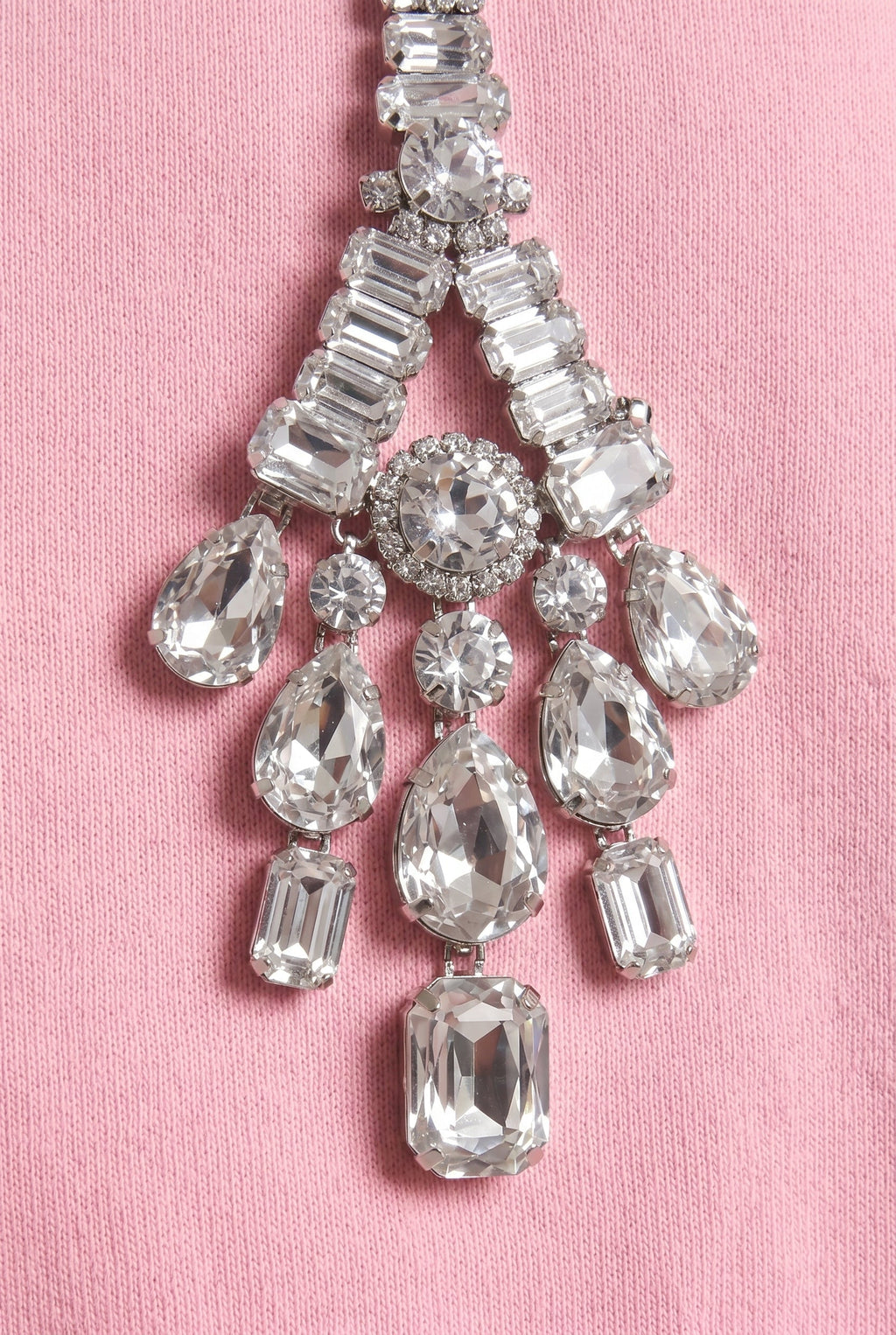 Pink hoodie with crystal embellished drawstrings and long sleeves