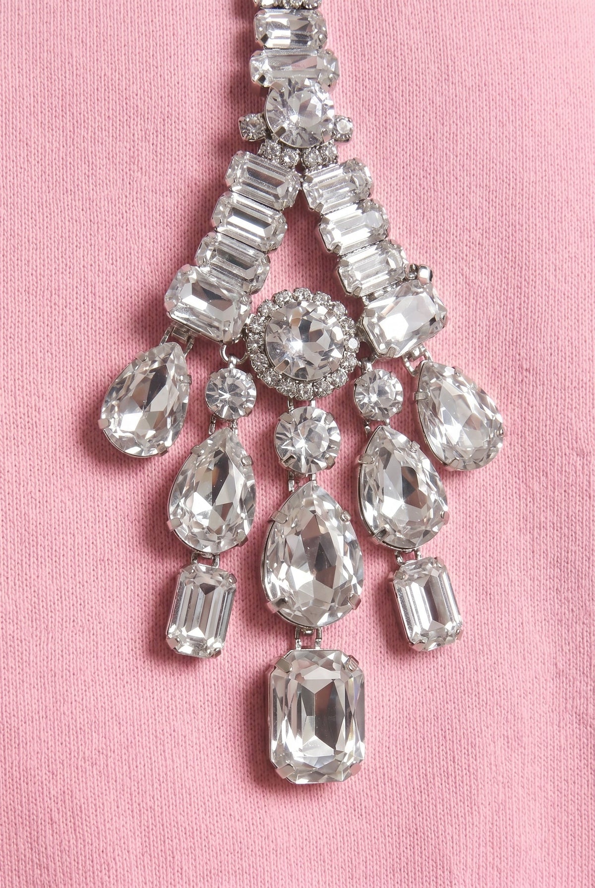 Pink hoodie with crystal embellished drawstrings and long sleeves