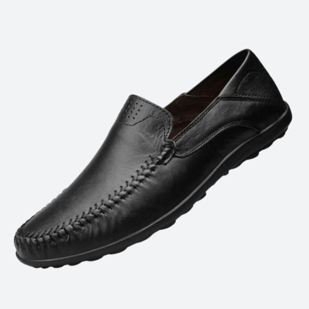 Men's moc toe slip-on loafers with stitched detailing and flat sole