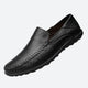 Men's moc toe slip-on loafers with stitched detailing and flat sole