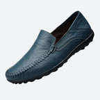 Men's moc toe slip-on loafers with stitched detailing and flat sole