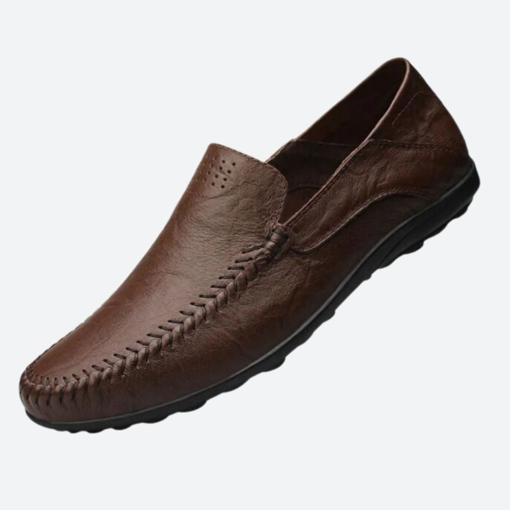 Men's moc toe slip-on loafers with stitched detailing and flat sole