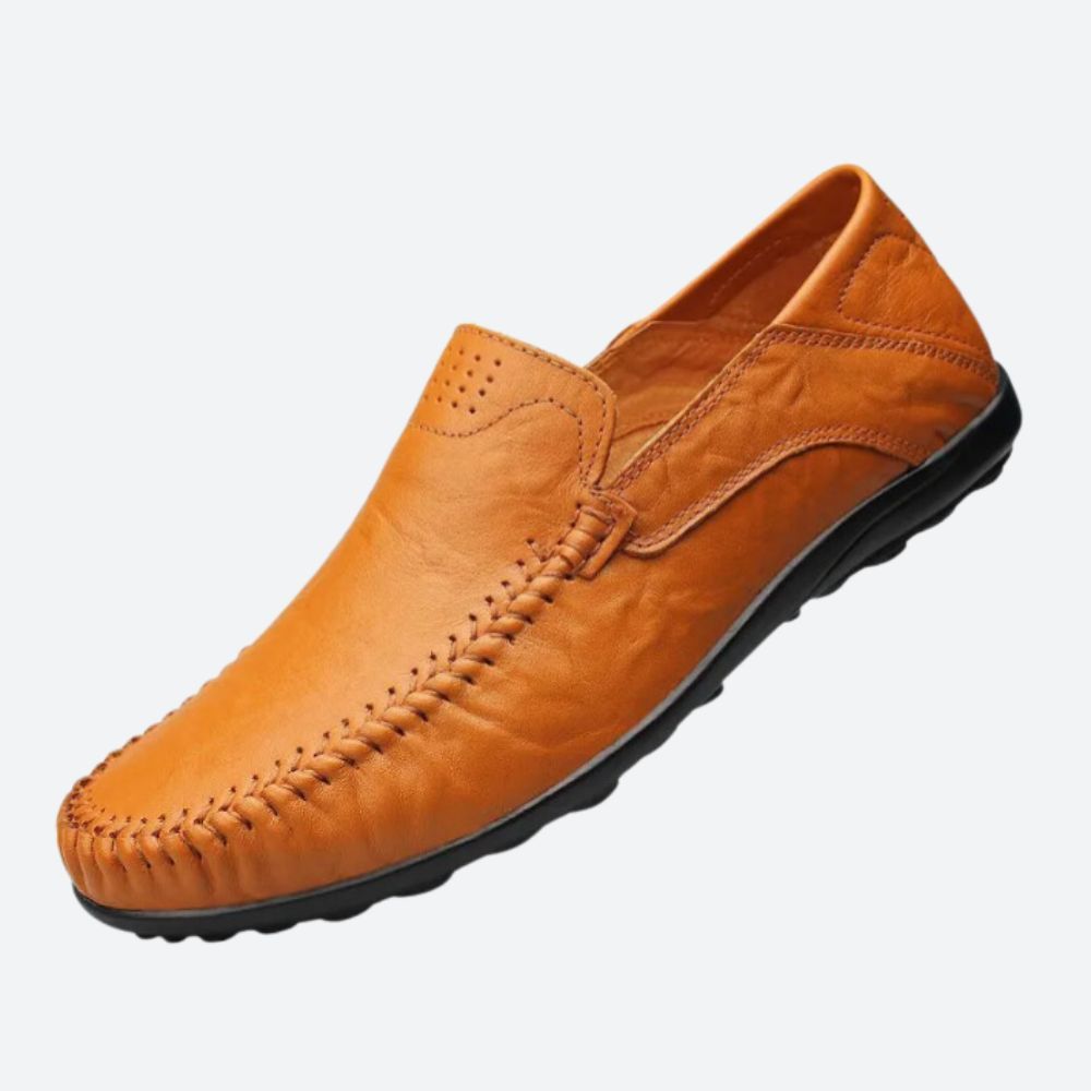 Men's moc toe slip-on loafers with stitched detailing and flat sole