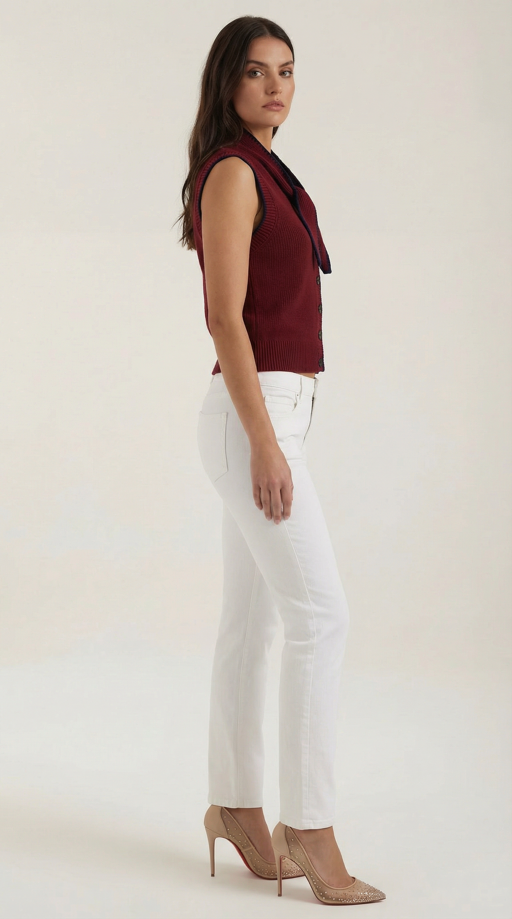 Women's sleeveless knitted cardigan with tie collar and button front