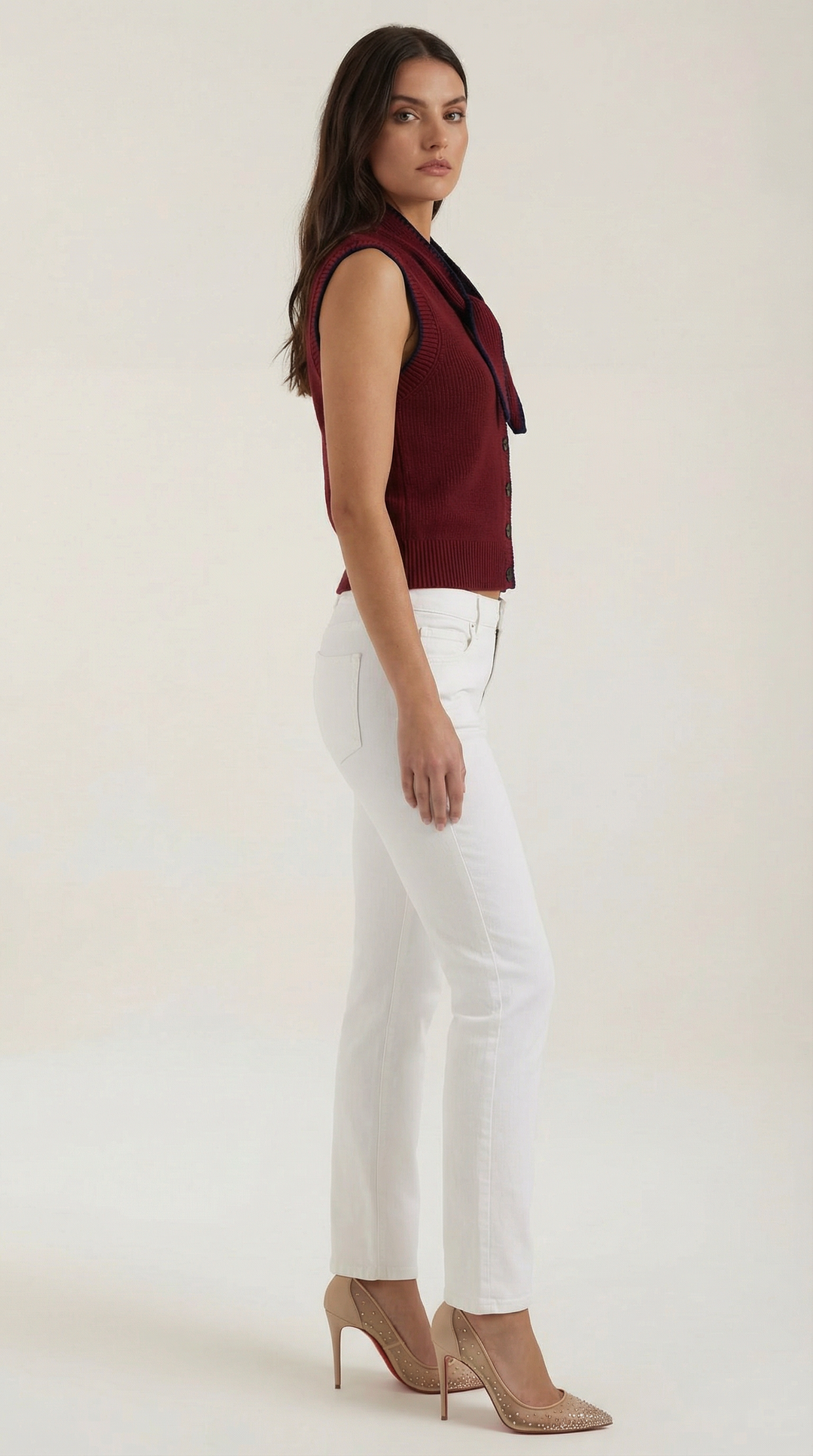Women's sleeveless knitted cardigan with tie collar and button front