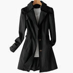 Women's velvet midi dress with round neck, long sleeves and pleated skirt