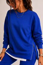 Women's crew neck sweatshirt and jogger set with side slits and cuffed trousers
