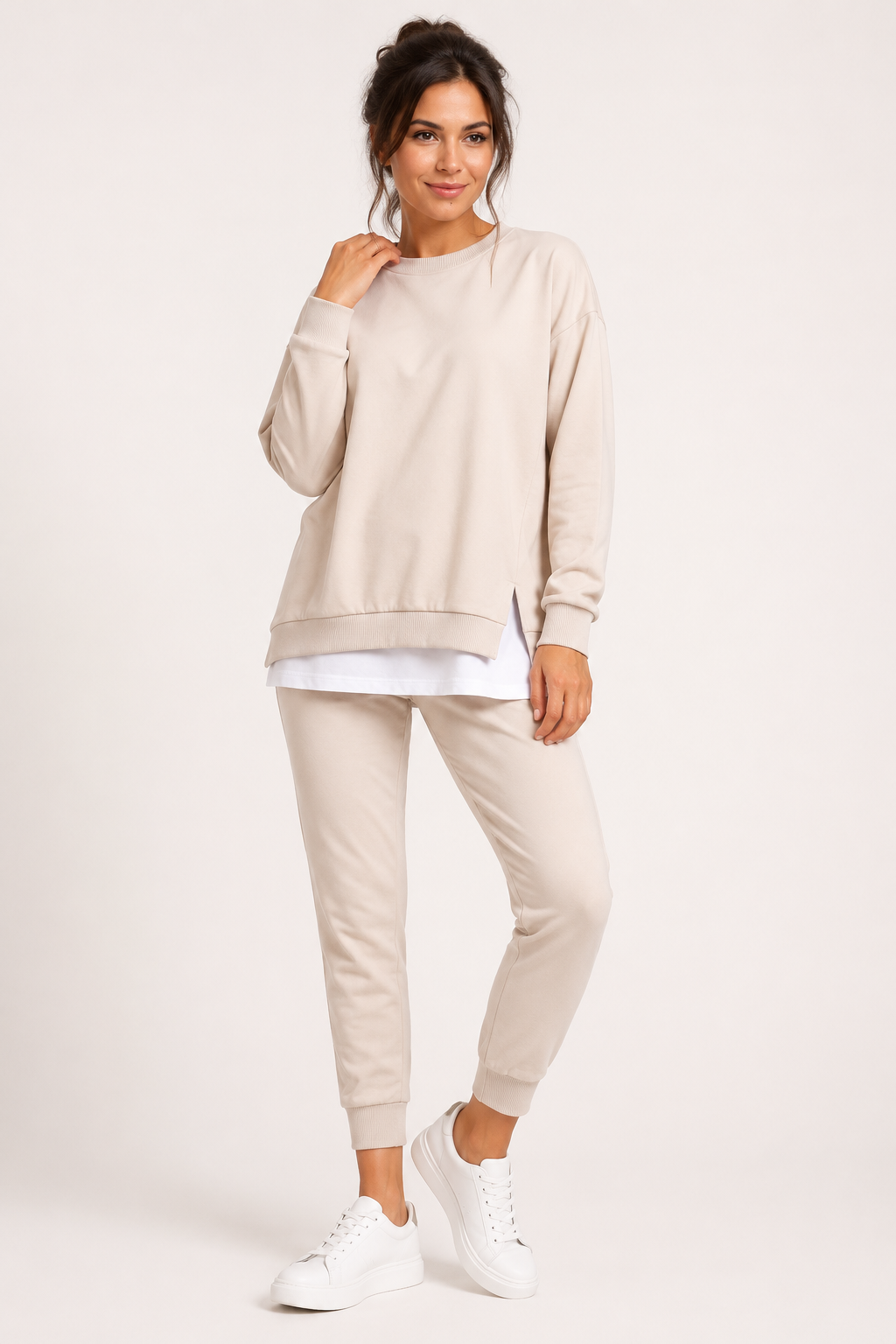 Women's crew neck sweatshirt and jogger set with side slits and cuffed trousers