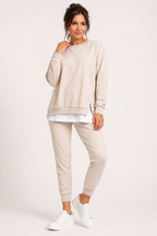Women's crew neck sweatshirt and jogger set with side slits and cuffed trousers