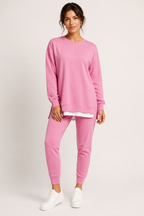 Women's crew neck sweatshirt and jogger set with side slits and cuffed trousers