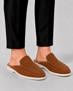 Men's open-heel loafer mules with stitched trim and flat soles