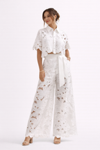Women's floral lace co ord set with cropped collared blouse and wide leg trousers