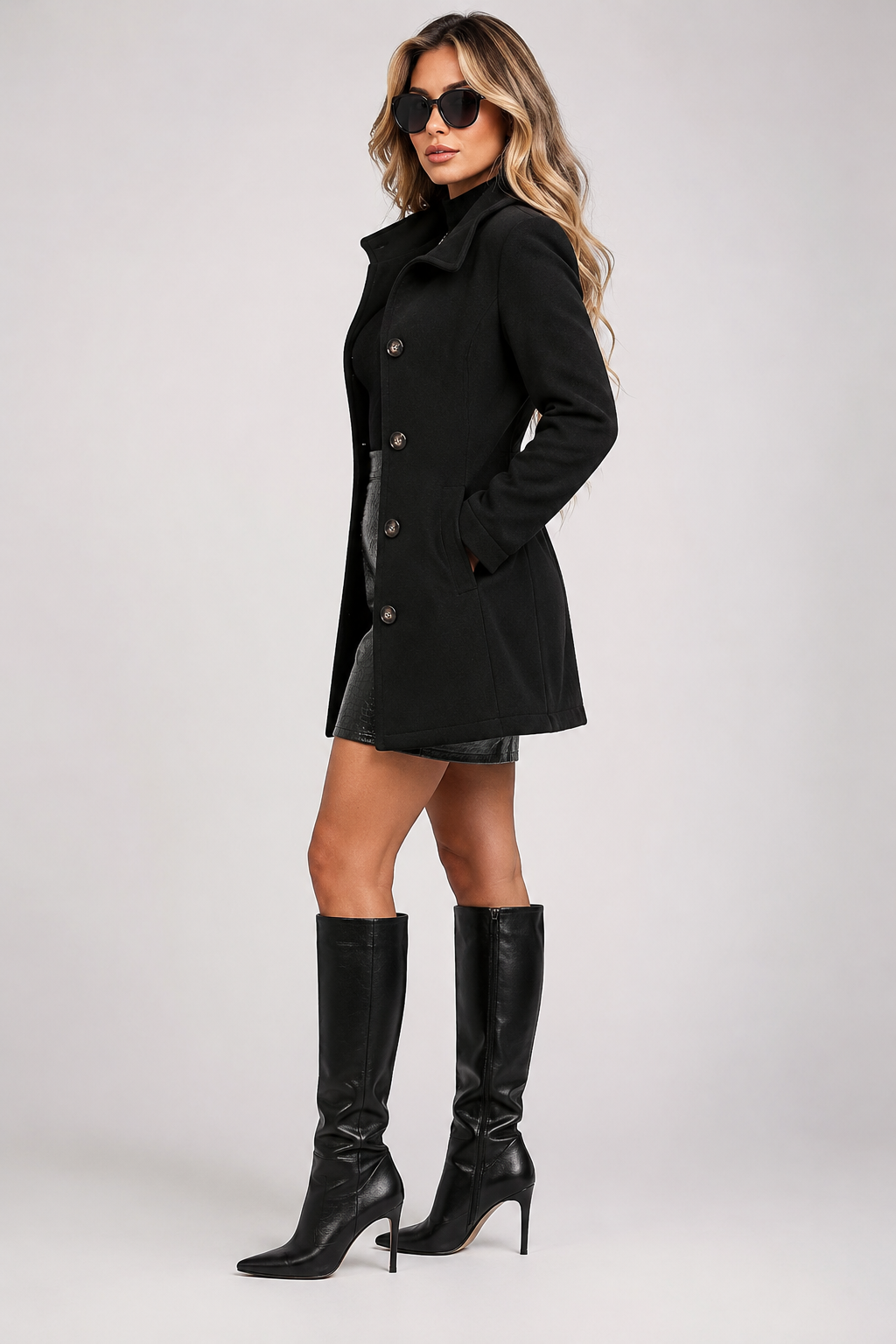 Women's button front trench coat with long sleeves and structured shaping