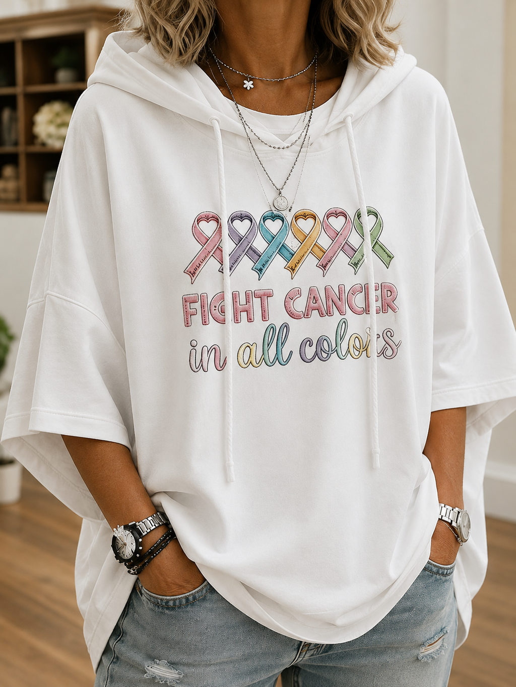 Women's short-sleeve hooded top with colourful awareness ribbon graphic