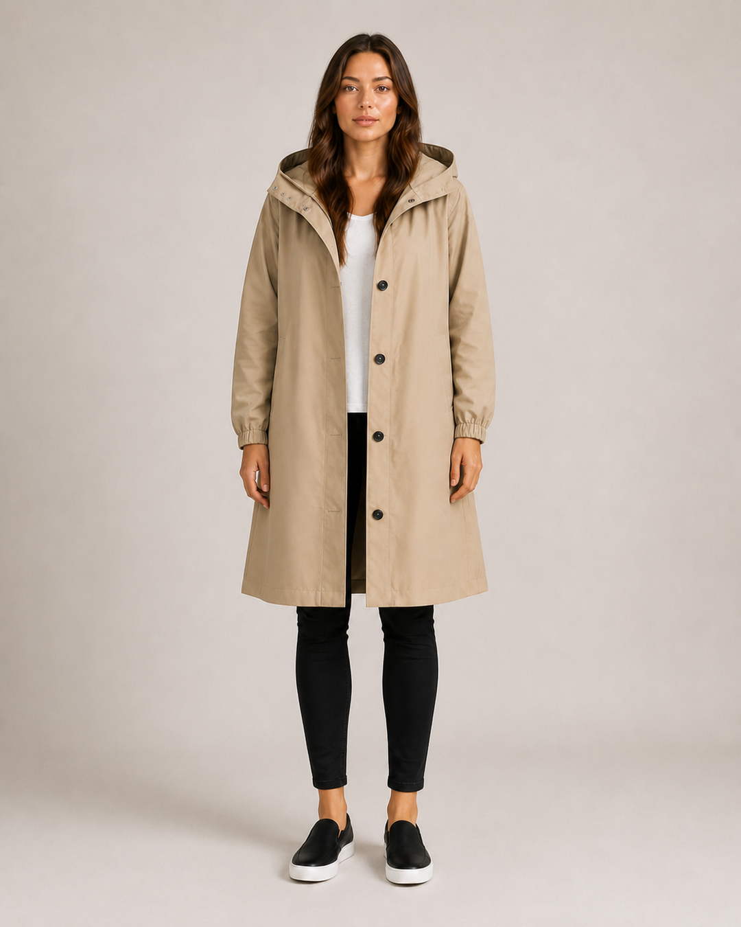 Women's hooded mid-length rain coat with button front and side pockets