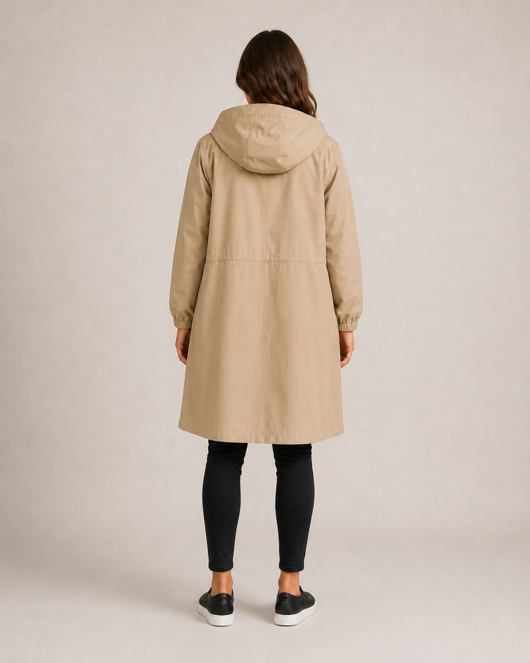 Women's hooded mid-length rain coat with button front and side pockets