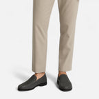 Men's perforated brown moc toe slip-on loafer with low heel