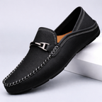 Men's slip-on loafers with moc toe stitching and metal bit detail