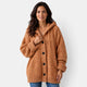 Women's long hooded chunky knit cardigan with button front and ribbed trims