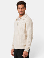 Men's cable knit quarter-zip sweater with spread collar and long sleeves