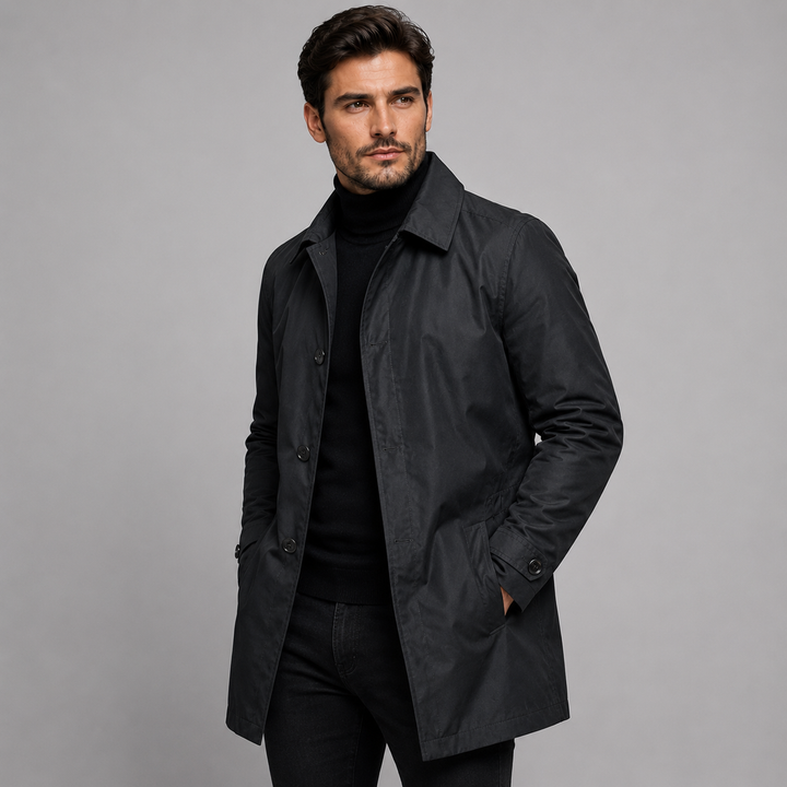 Men's black tailored longline coat with a button front and quilted lining