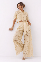 Women's floral lace co ord set with cropped collared blouse and wide leg trousers