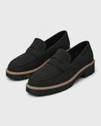 Women's slip-on loafers with buckle detail and lug soles