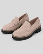 Women's slip-on loafers with buckle detail and lug soles