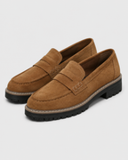 Women's slip-on loafers with buckle detail and lug soles